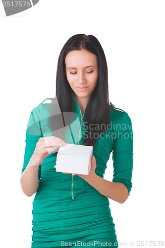 Image of Pretty girl holding white box with gift