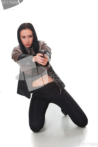 Image of Beautiful sexy girl with gun