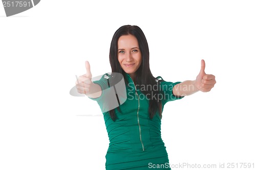 Image of Girl in green dress shows thumbs up