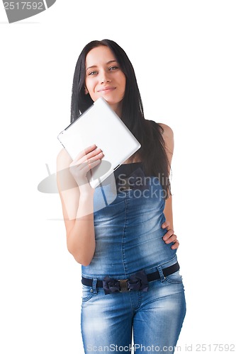 Image of Young girl posing in studio with tablet pc