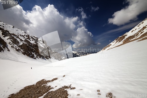 Image of Hiker in snowy mountains