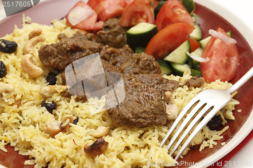 Image of Beef madras curry meal closeup
