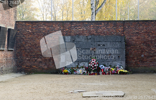 Image of memorial at the wall at Auschwitz German Nazi concentration deat