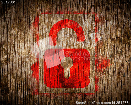 Image of Red  Icon of Opened Padlock on Wood.