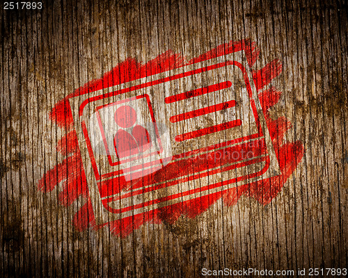 Image of Red ID Card Icon Painted by Stencil on Wood.