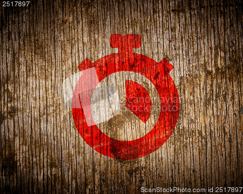 Image of Red Stopwatch Icon Painted by Stencil on Wood.