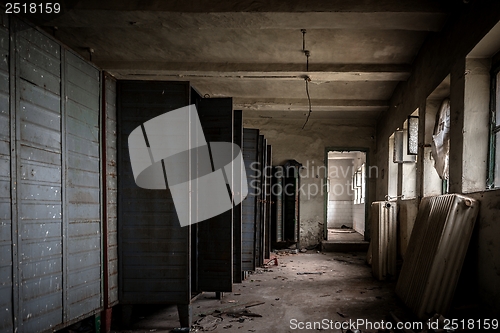 Image of Dark room with steel lockers