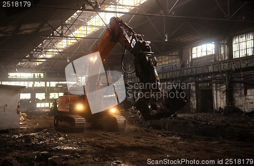 Image of Industrial interior with bulldozer inside