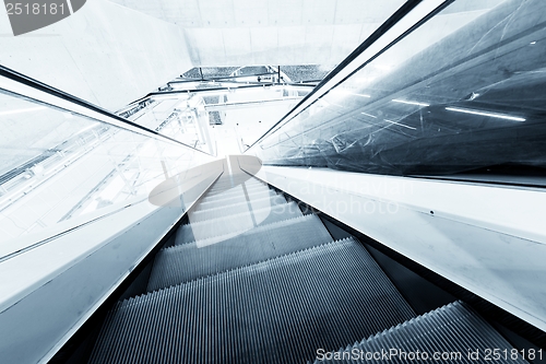 Image of Moving escalator in the business center