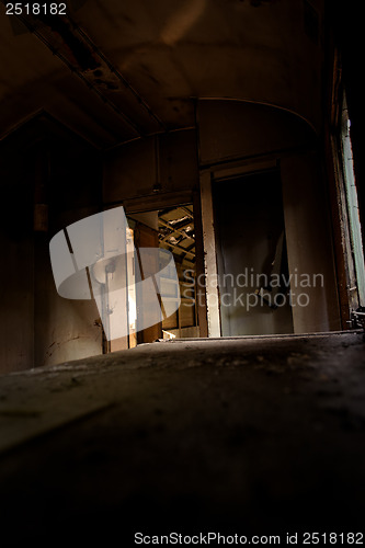 Image of Photo of a door opened with shadows