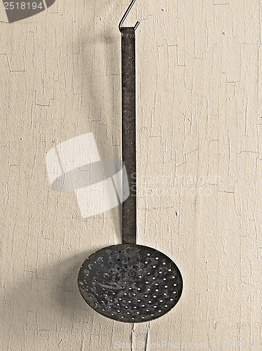 Image of vintage skimmer ladle