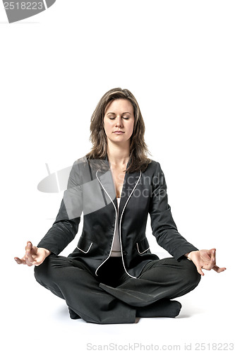 Image of Business woman performs yoga