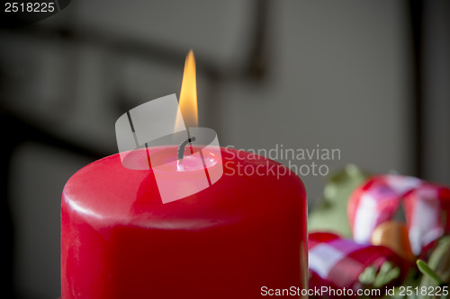 Image of Datail burning red candle