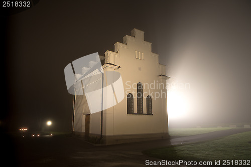 Image of church annex a foggy night