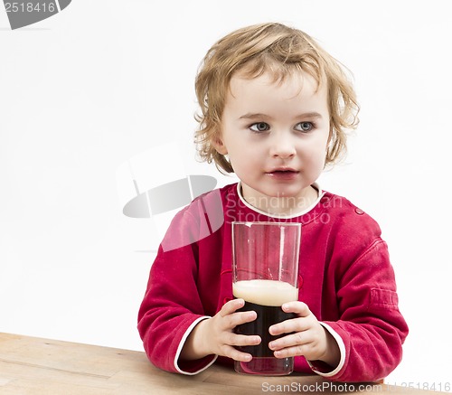 Image of young girl drinking beer