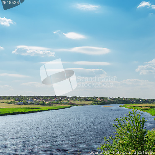 Image of river and blue sky over it