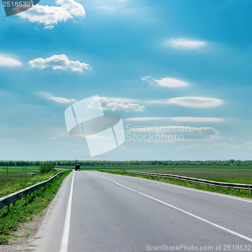 Image of blue sky and asphalt road