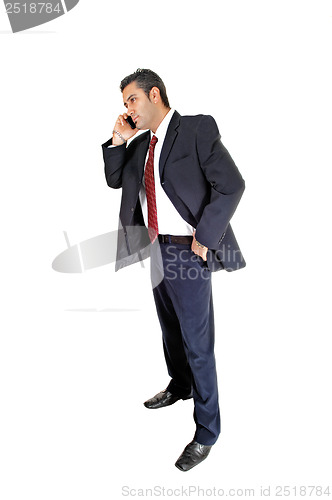 Image of Businessman phoning.