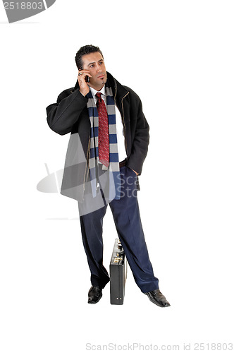 Image of Businessman on cell phone.