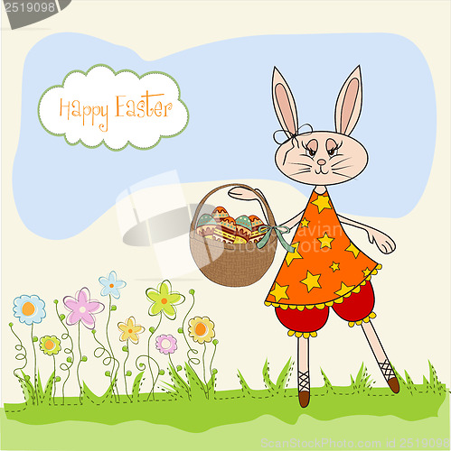 Image of Easter bunny with a basket of Easter eggs