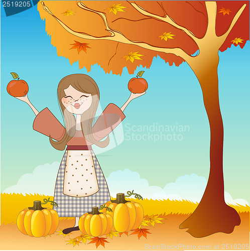 Image of autumn girl with apples and pumpkins