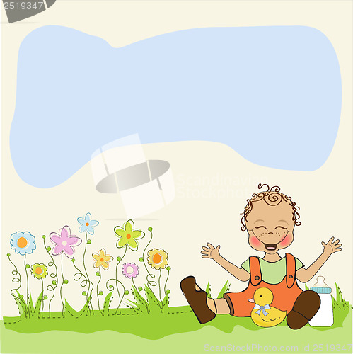 Image of baby boy playing with his duck toy, welcome baby card