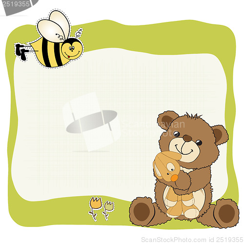 Image of childish greeting card with teddy bear and his toy