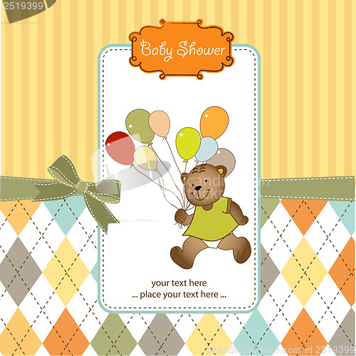 Image of baby shower card with teddy bear toy