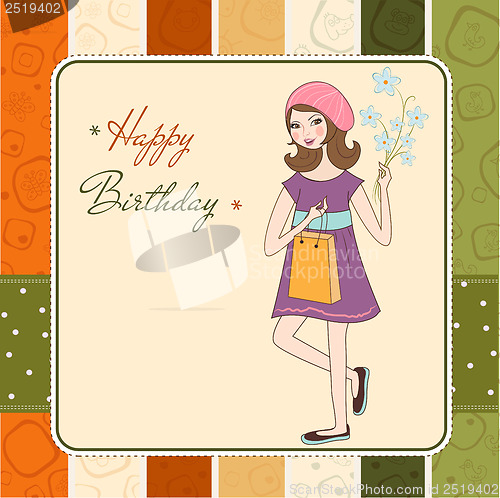Image of pretty girl with gift and flowers. birthday card