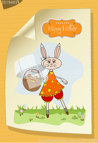 Image of Easter bunny with a basket of Easter eggs