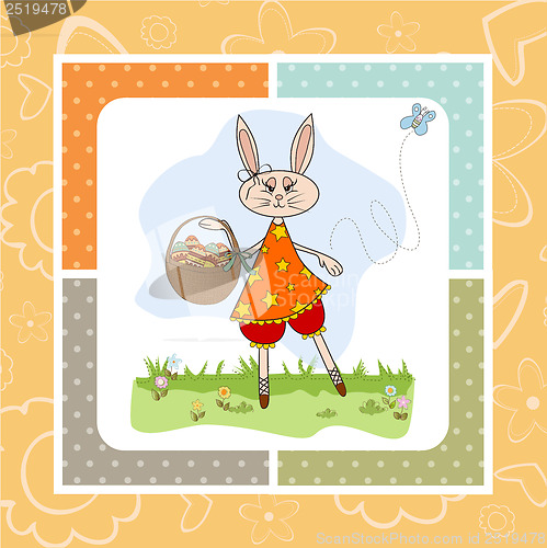 Image of Easter bunny with a basket of Easter eggs