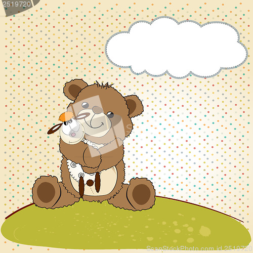 Image of childish greeting card with teddy bear and his toy