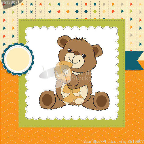 Image of childish greeting card with teddy bear and his toy