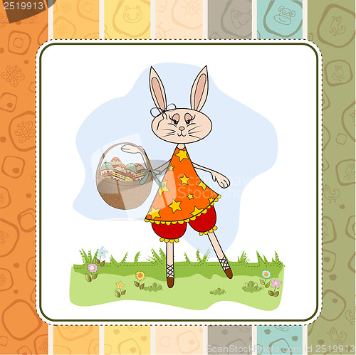 Image of Easter bunny with a basket of Easter eggs