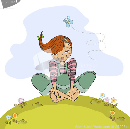 Image of romantic girl sitting barefoot in the grass