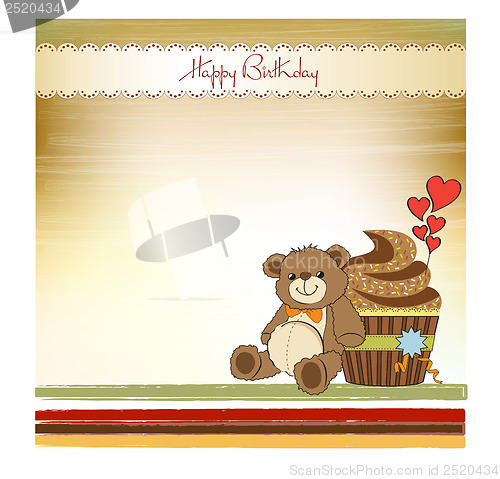 Image of birthday greeting card with cupcake and teddy bear