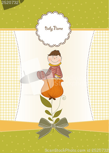 Image of greeting card with a baby sitting on a flower