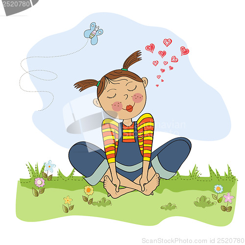 Image of romantic girl sitting barefoot in the grass
