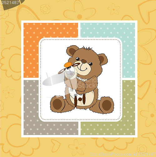 Image of childish greeting card with teddy bear and his toy