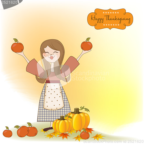 Image of autumn girl with apples and pumpkins