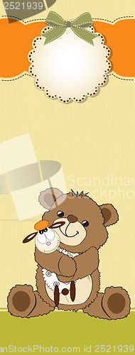 Image of childish greeting card with teddy bear and his toy