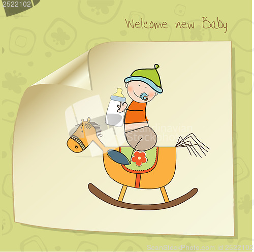 Image of baby boy shower shower with wood horse toy