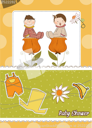 Image of greeting card with a baby sitting on a flower