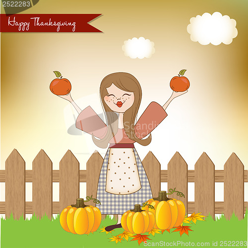 Image of autumn girl with apples and pumpkins