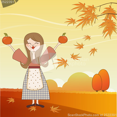 Image of autumn girl with apples and pumpkins