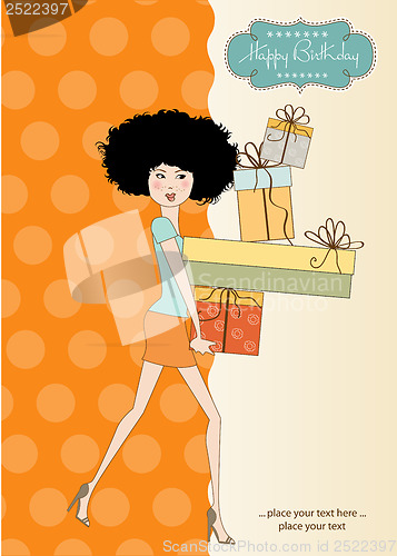 Image of birthday card - pretty young lady with arms full of gifts