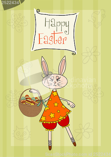 Image of Easter bunny with a basket of Easter eggs