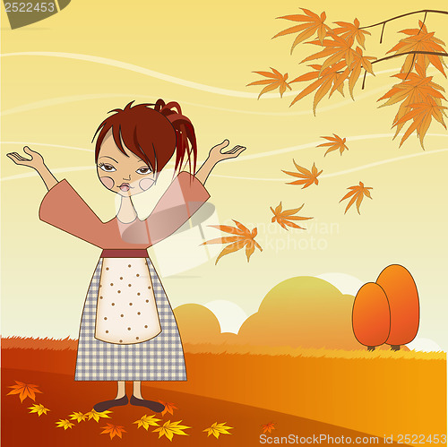 Image of young girl with autumn leaves