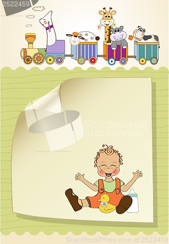 Image of baby boy playing with his duck toy, welcome baby card