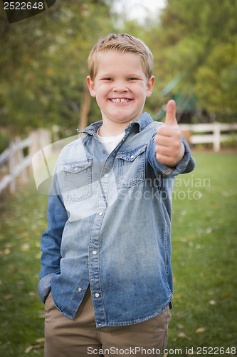 Image of Handsome Young Boy Giving the Thumbs Up
